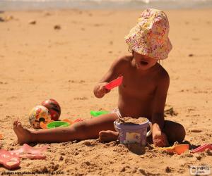 Puzzle Κορίτσι παίζει στην παραλία
